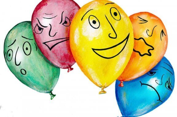 En gruppe ballonger med forskjellige ansiktsuttrykk.