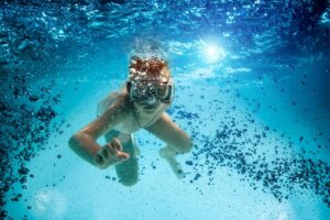 Alle fordelene med dykking for barn
